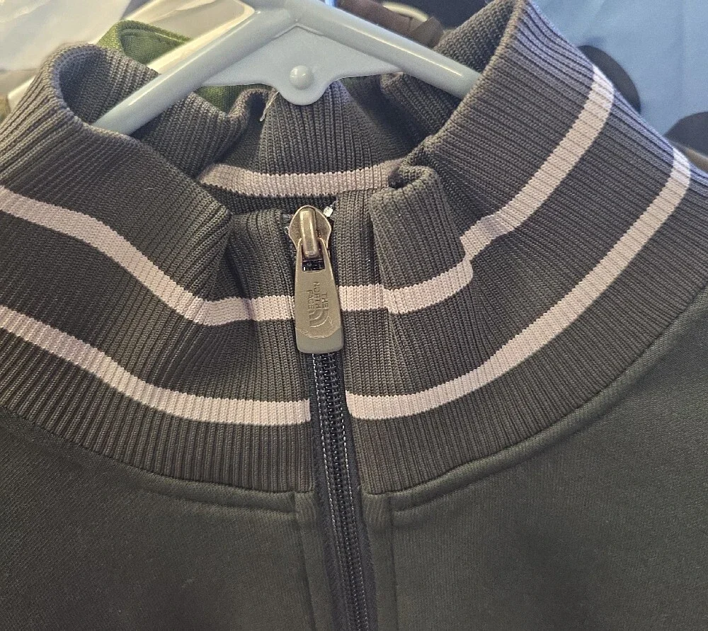 The North Face Dark Green Track Jacket with Red & Yellow Accents